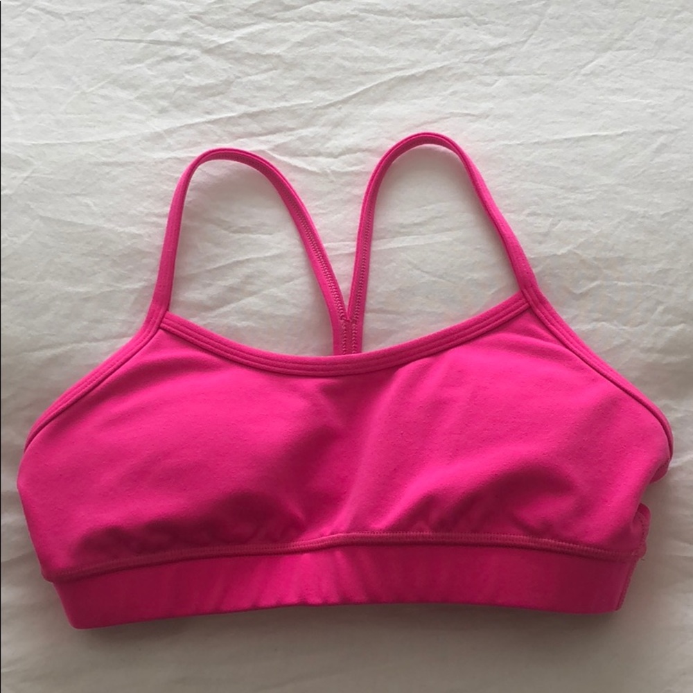 Neon pink Flow Y sports bra
